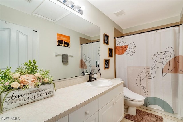 full bathroom featuring visible vents, vanity, toilet, and tile patterned floors