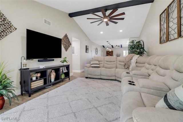 living room with beamed ceiling, high vaulted ceiling, hardwood / wood-style floors, and ceiling fan