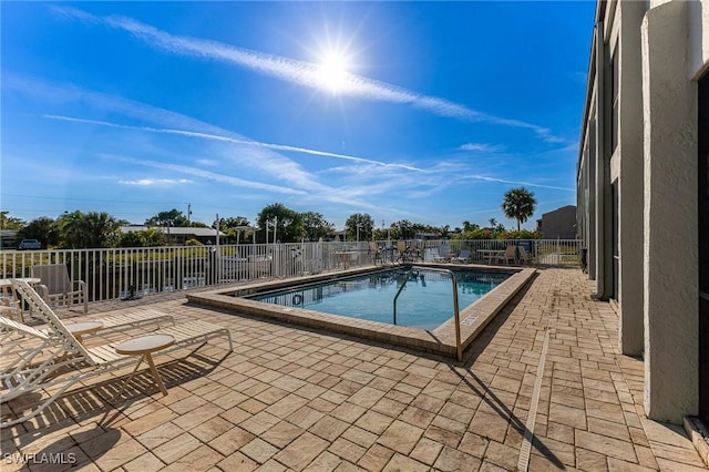 view of pool with a patio area