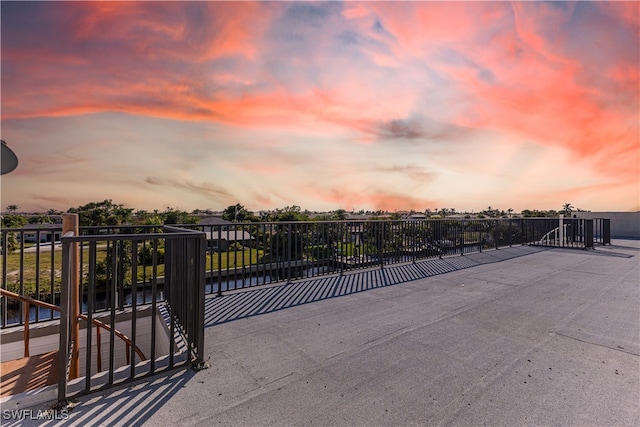 view of gate at dusk