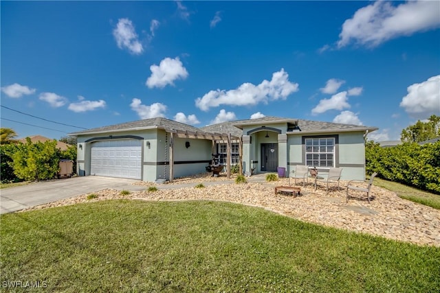 ranch-style home featuring a garage and a front yard