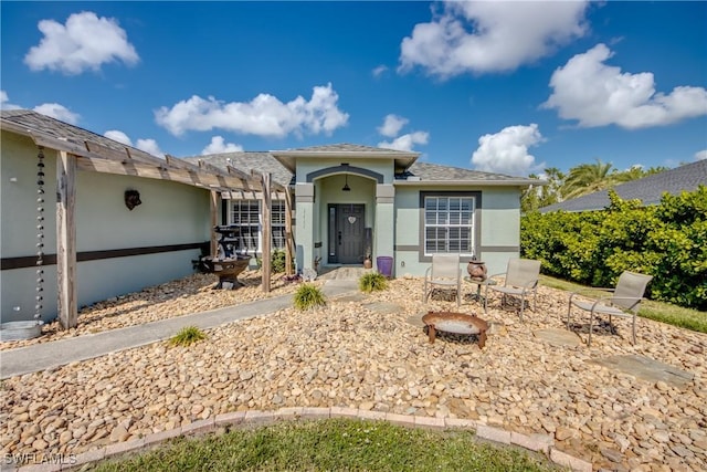 ranch-style home with a patio area