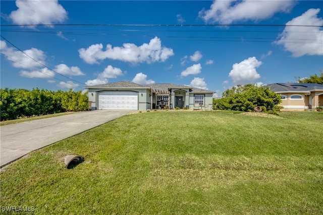 view of front facade with a garage and a front yard