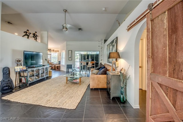 living room featuring dark tile patterned floors