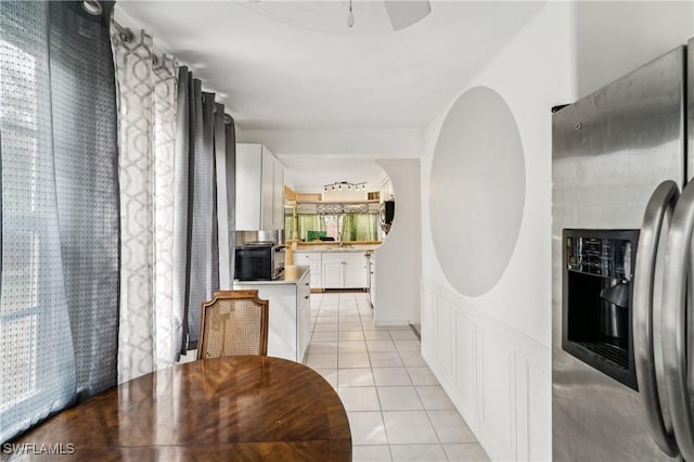 interior space featuring light tile patterned floors