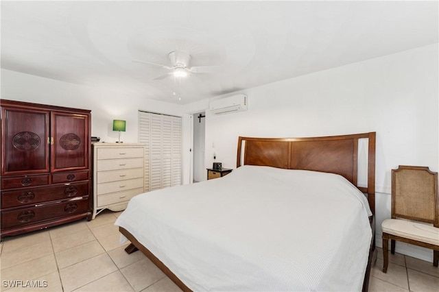 bedroom with a ceiling fan, light tile patterned floors, and a wall mounted AC