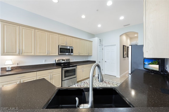 kitchen with appliances with stainless steel finishes and sink