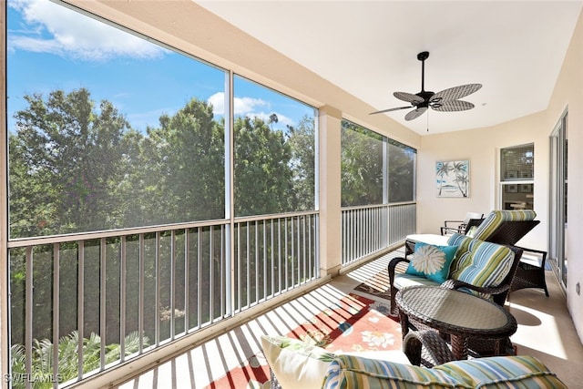 sunroom / solarium with ceiling fan