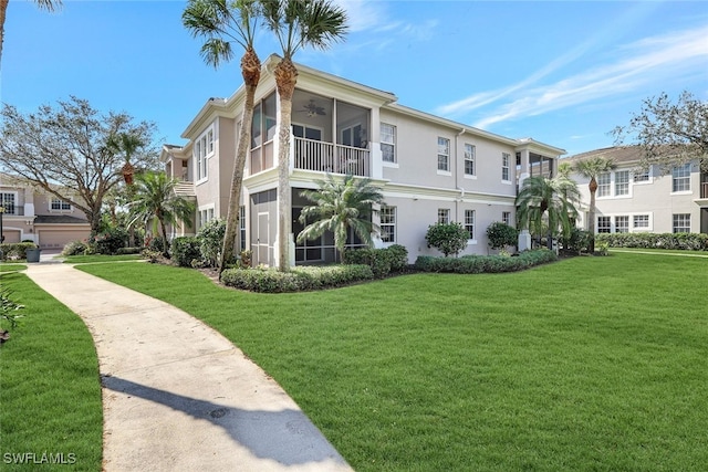 view of home's exterior with a lawn