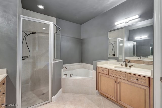 bathroom with vanity, separate shower and tub, and tile patterned flooring