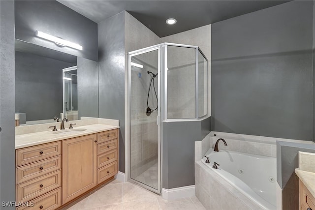 bathroom featuring vanity, tile patterned floors, and separate shower and tub