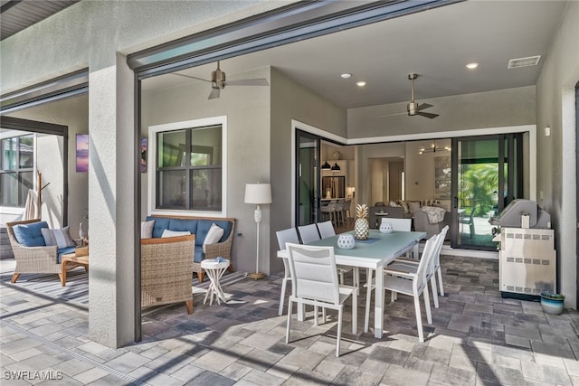 view of patio / terrace featuring an outdoor living space and ceiling fan