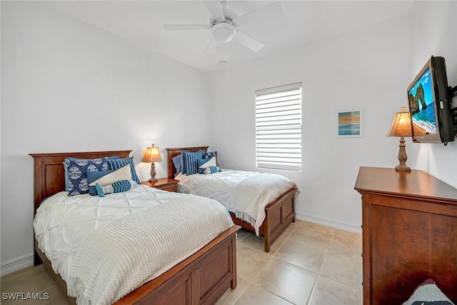 6231 Brunello Ln, Naples, FL 34113 - bedroom with ceiling fan, baseboards, and light tile patterned floors