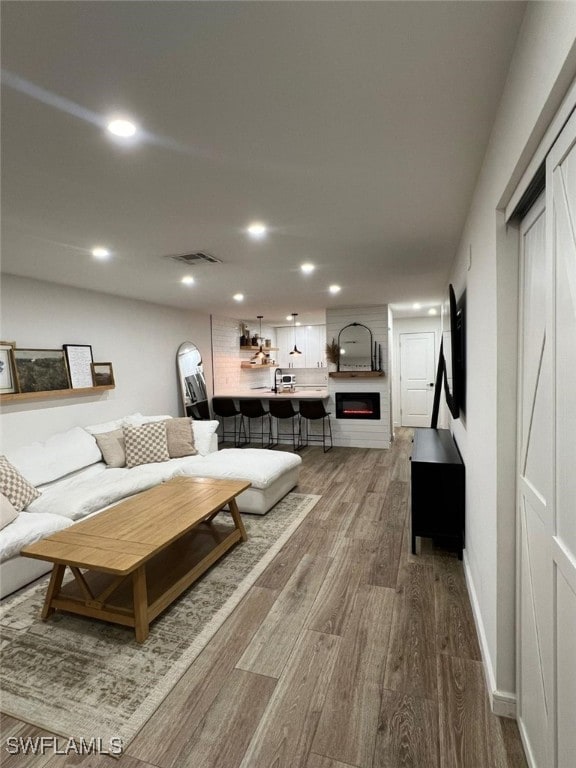 living room with hardwood / wood-style floors