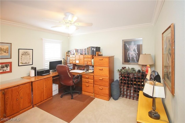 home office featuring crown molding, light carpet, and ceiling fan