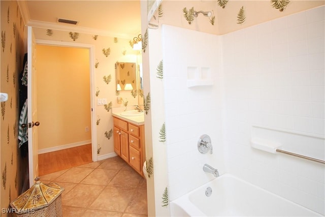 bathroom featuring vanity, tile patterned floors, and shower / washtub combination