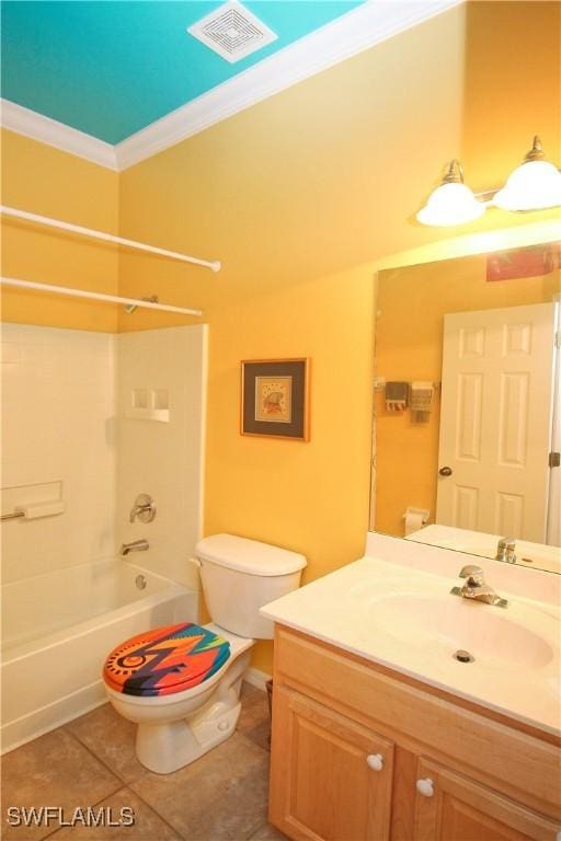 full bathroom featuring tile patterned floors, toilet, tub / shower combination, ornamental molding, and vanity