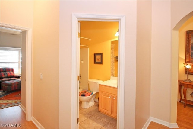 hallway featuring light tile patterned floors