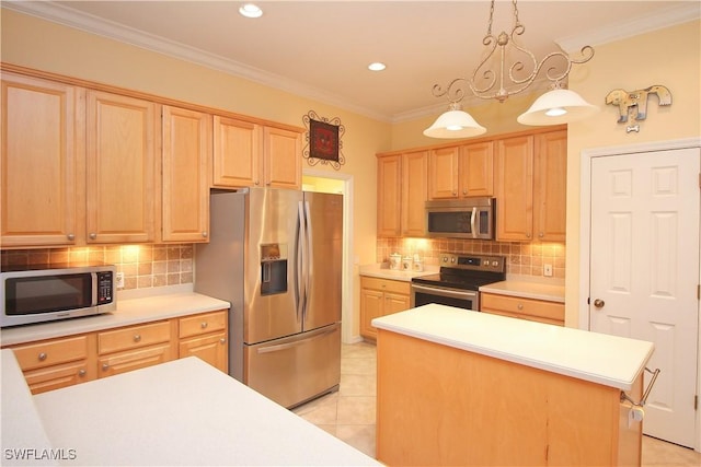 kitchen with pendant lighting, crown molding, appliances with stainless steel finishes, a kitchen island, and light brown cabinets