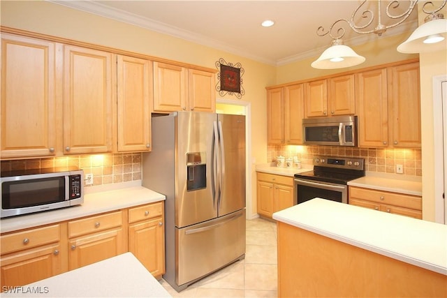 kitchen featuring hanging light fixtures, light tile patterned floors, ornamental molding, appliances with stainless steel finishes, and decorative backsplash