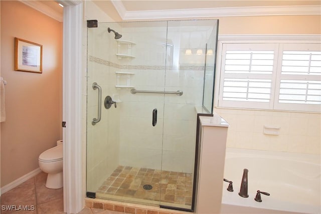 bathroom featuring crown molding, tile patterned floors, toilet, and separate shower and tub