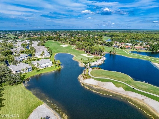 bird's eye view featuring view of golf course and a water view