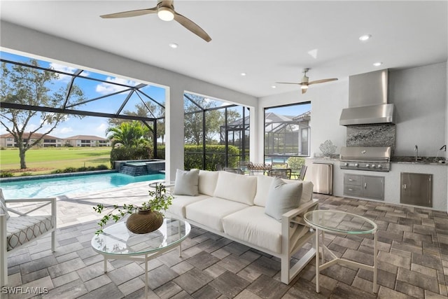 living room featuring sink and ceiling fan