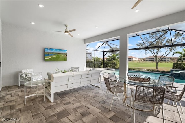 exterior space featuring ceiling fan