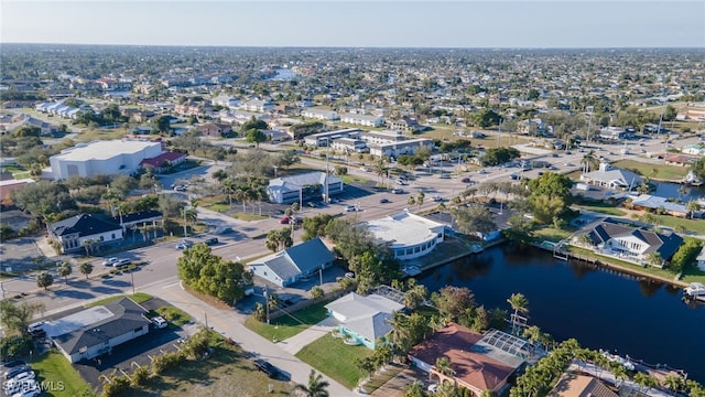 aerial view featuring a residential view and a water view