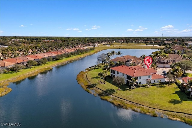 birds eye view of property featuring a residential view and a water view