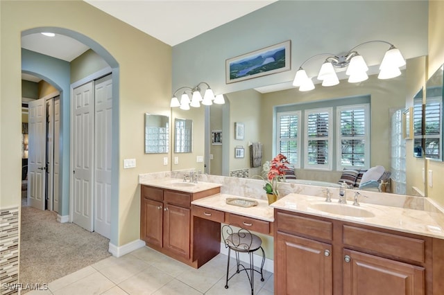 bathroom with vanity and tile patterned flooring