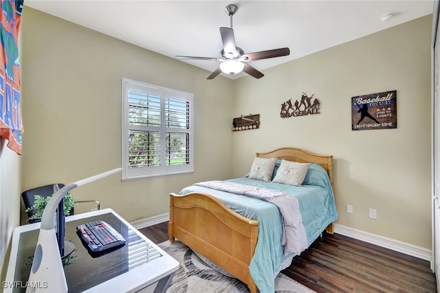 bedroom featuring ceiling fan and dark wood-type flooring