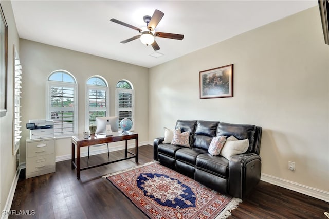 living room with dark hardwood / wood-style floors and ceiling fan