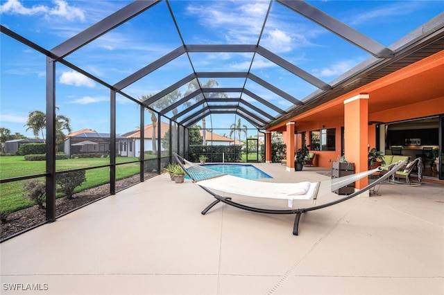 view of pool featuring a patio and a lanai