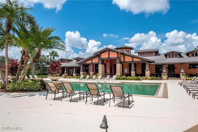 view of swimming pool featuring a patio