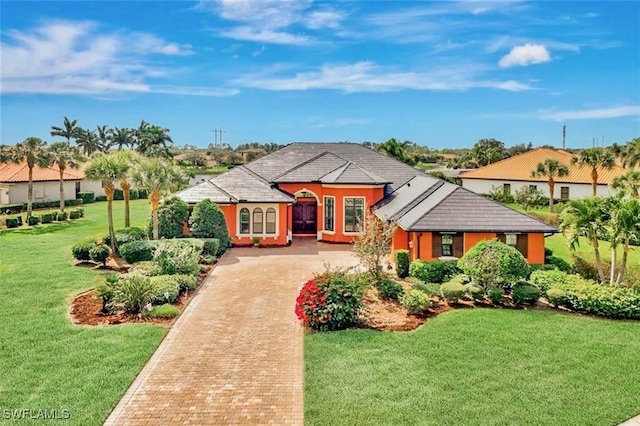 view of front of home with a front yard