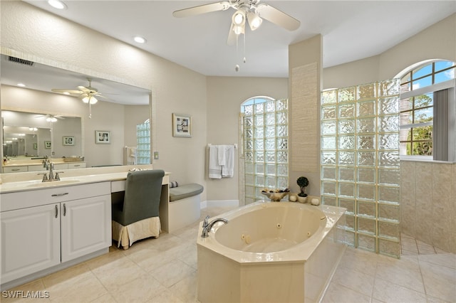 bathroom with tile patterned flooring, recessed lighting, vanity, visible vents, and a jetted tub