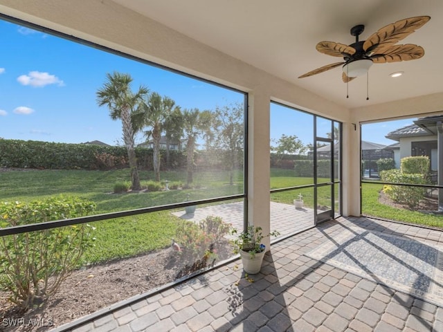 17183 Ashford Ter, Fort Myers, FL 33967 - unfurnished sunroom featuring ceiling fan