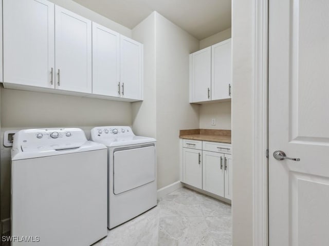 17183 Ashford Ter, Fort Myers, FL 33967 - laundry area with cabinets and independent washer and dryer