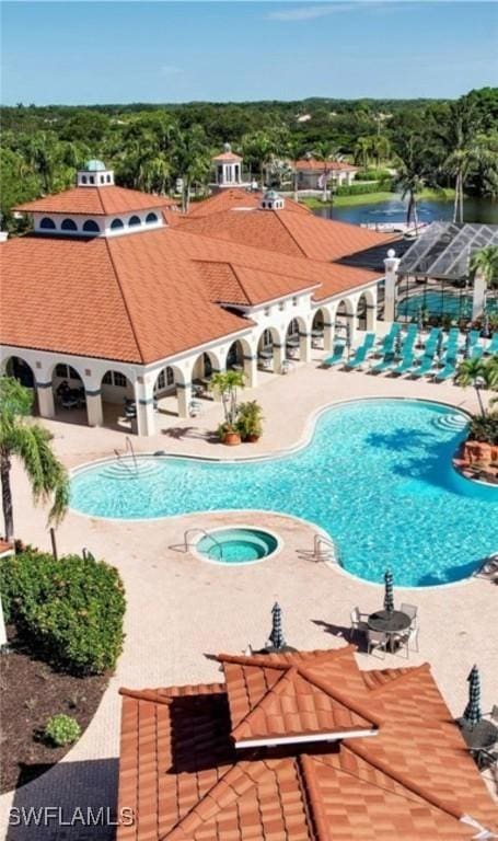 23861 Costa Del Sol Rd Unit 203, Estero, FL 34135 - community pool with a patio and a water view