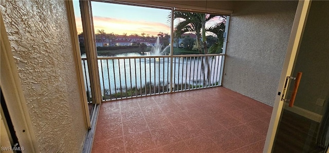 23861 Costa Del Sol Rd Unit 203, Estero, FL 34135 - balcony featuring a water view