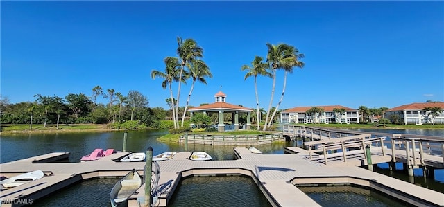 23861 Costa Del Sol Rd Unit 203, Estero, FL 34135 - dock featuring a water view