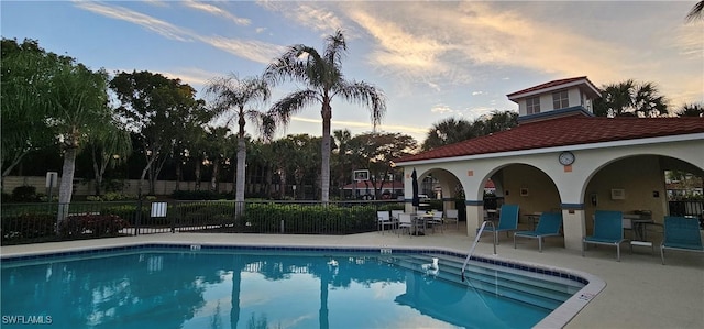 23861 Costa Del Sol Rd Unit 203, Estero, FL 34135 - community pool with a patio