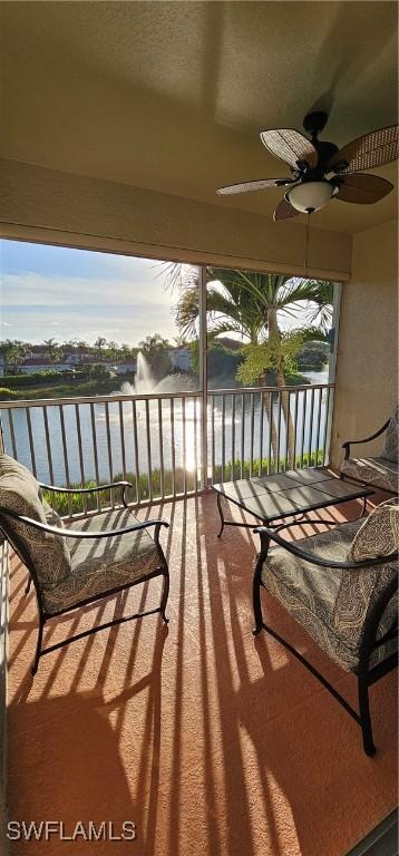 23861 Costa Del Sol Rd Unit 203, Estero, FL 34135 - balcony with a water view and ceiling fan