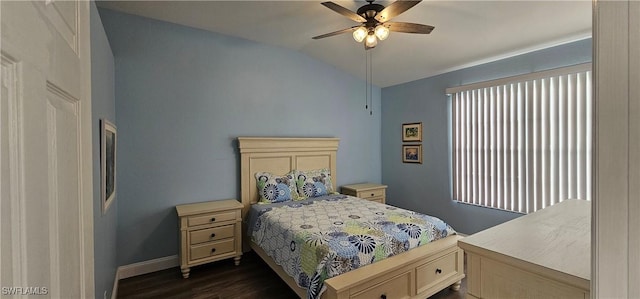 23861 Costa Del Sol Rd Unit 203, Estero, FL 34135 - bedroom featuring lofted ceiling, dark wood-style floors, baseboards, and ceiling fan