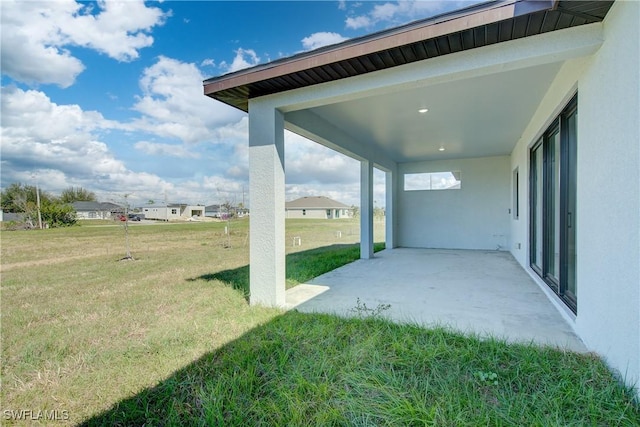 view of yard with a patio area