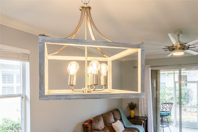 2291 Granby Dr, Lehigh Acres, FL 33973 - interior details featuring ornamental molding and ceiling fan with notable chandelier