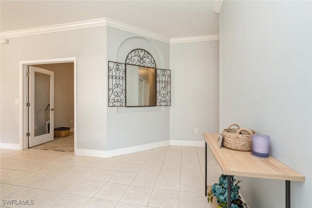 2291 Granby Dr, Lehigh Acres, FL 33973 - hallway with baseboards, ornamental molding, and light tile patterned floors