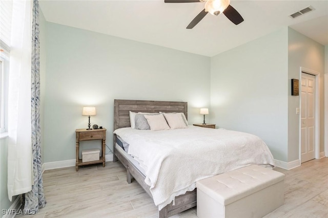 bedroom featuring light wood-type flooring and ceiling fan