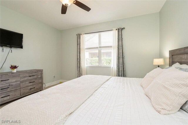 2291 Granby Dr, Lehigh Acres, FL 33973 - bedroom with a ceiling fan and baseboards